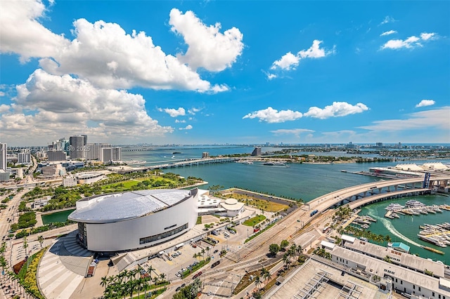 bird's eye view featuring a water view and a city view