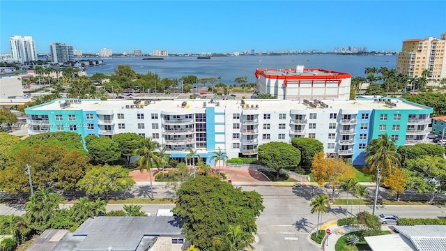 bird's eye view featuring a view of city and a water view