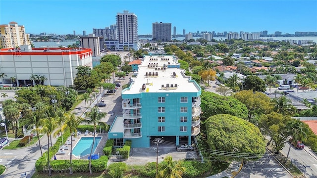 drone / aerial view featuring a city view