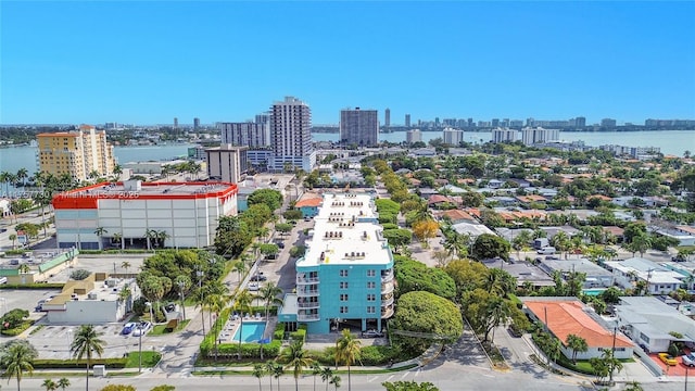 bird's eye view with a city view and a water view