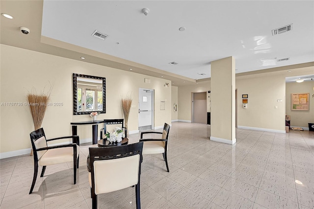 dining room with recessed lighting, visible vents, and baseboards