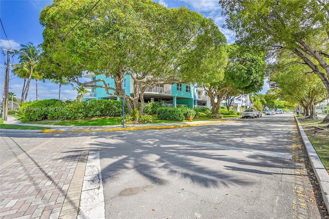 view of road featuring curbs and sidewalks