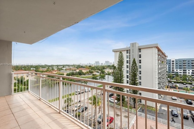 balcony featuring a city view