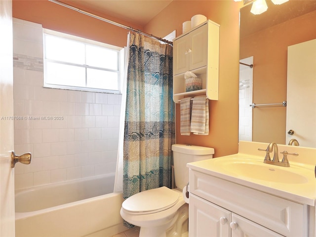 bathroom featuring shower / tub combo, vanity, and toilet