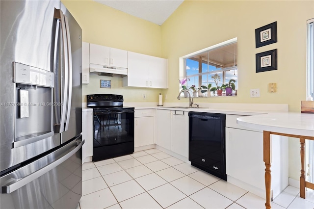 kitchen with under cabinet range hood, a sink, white cabinets, light countertops, and black appliances