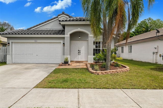 view of front of property featuring an attached garage, a tile roof, driveway, stucco siding, and a front yard