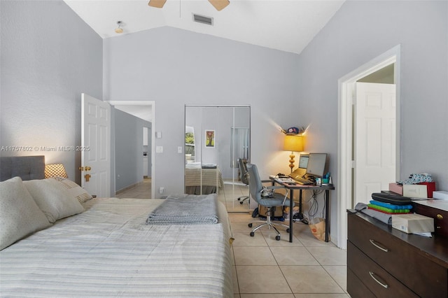 bedroom with light tile patterned floors, a ceiling fan, visible vents, and high vaulted ceiling