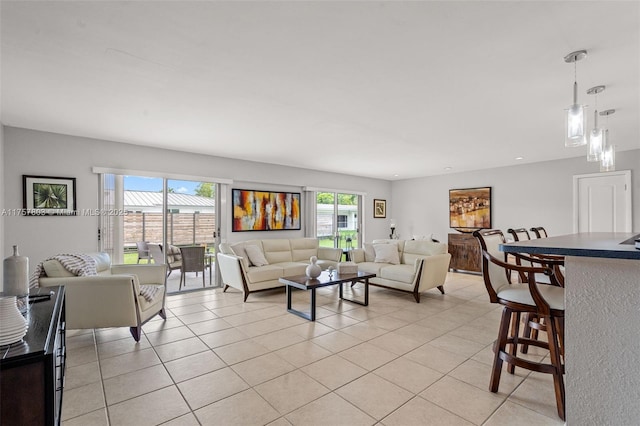 living area featuring light tile patterned floors