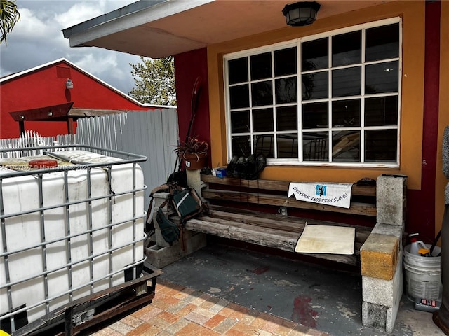 view of patio / terrace featuring fence