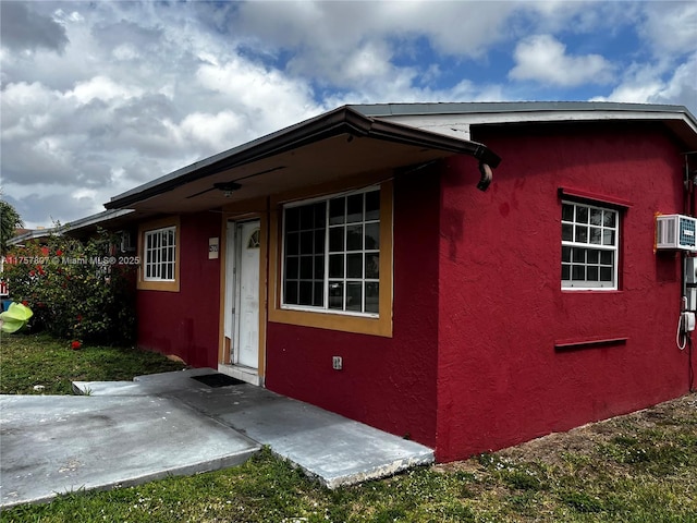 exterior space with stucco siding