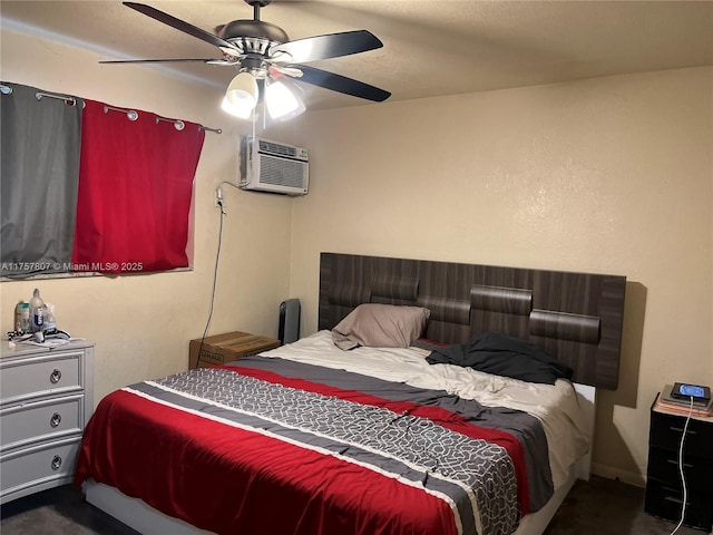 bedroom with an AC wall unit and ceiling fan