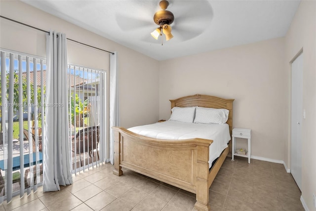 bedroom featuring access to outside, light tile patterned flooring, ceiling fan, and baseboards