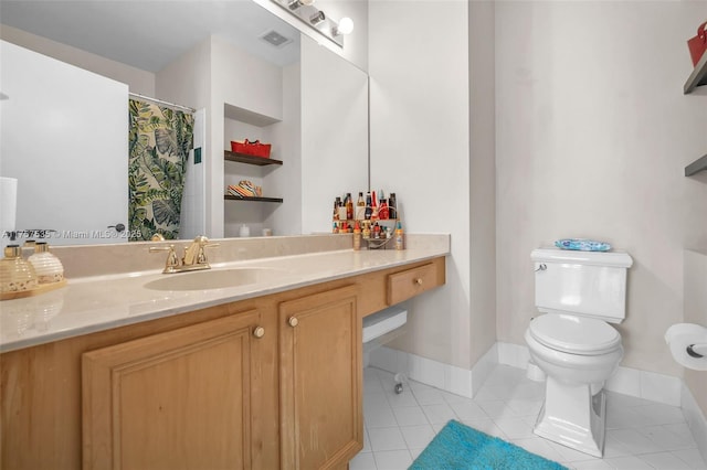 full bathroom featuring visible vents, toilet, vanity, tile patterned flooring, and baseboards