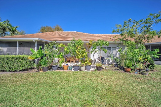 view of yard featuring a sunroom