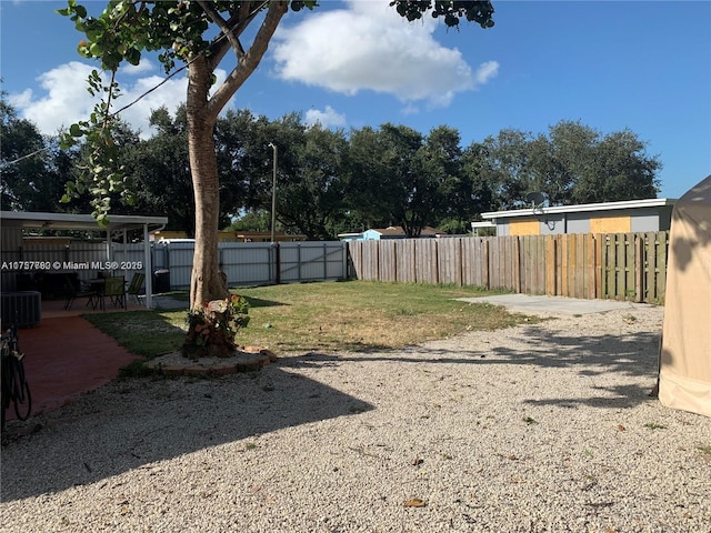 view of yard with a patio area and fence