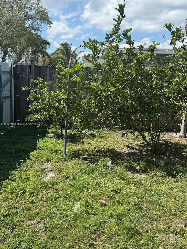 view of yard with fence