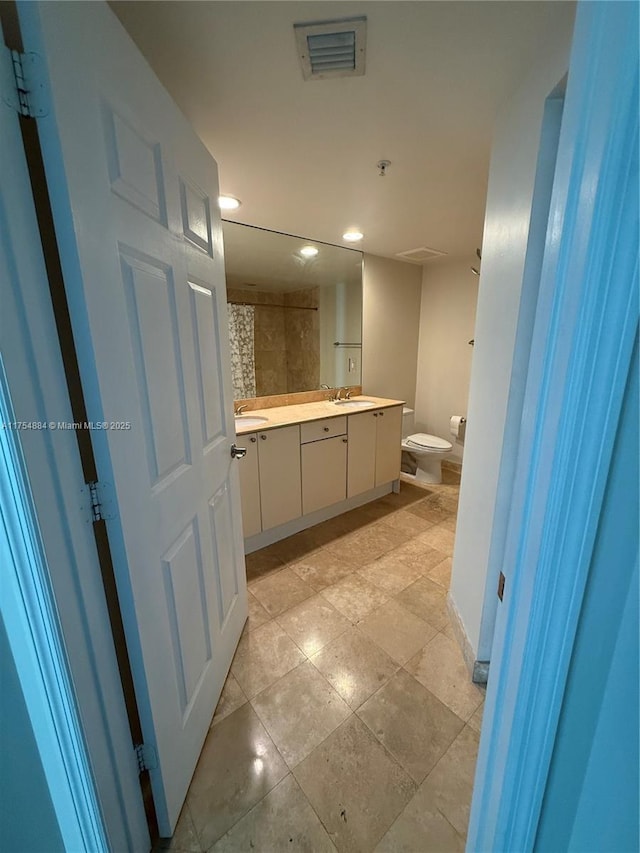 1745 E Hallandale Beach Blvd Unit 804W, Hallandale Beach, FL 33009 - full bath featuring toilet, recessed lighting, and double vanity