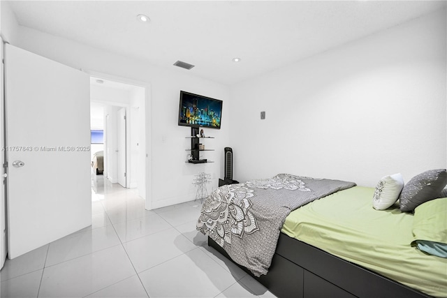 bedroom featuring light tile patterned floors, visible vents, and recessed lighting