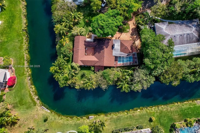 bird's eye view with a water view