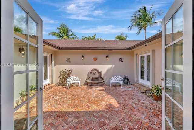 view of patio / terrace featuring french doors