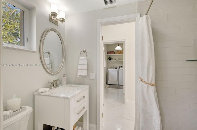 bathroom with toilet, a shower with shower curtain, vanity, visible vents, and marble finish floor