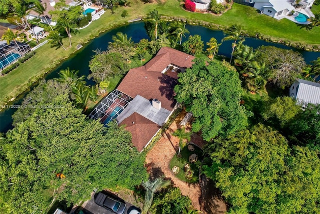 birds eye view of property featuring a water view