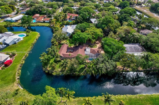 birds eye view of property featuring a residential view and a water view