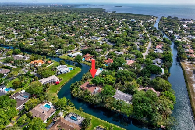 birds eye view of property featuring a water view and a residential view