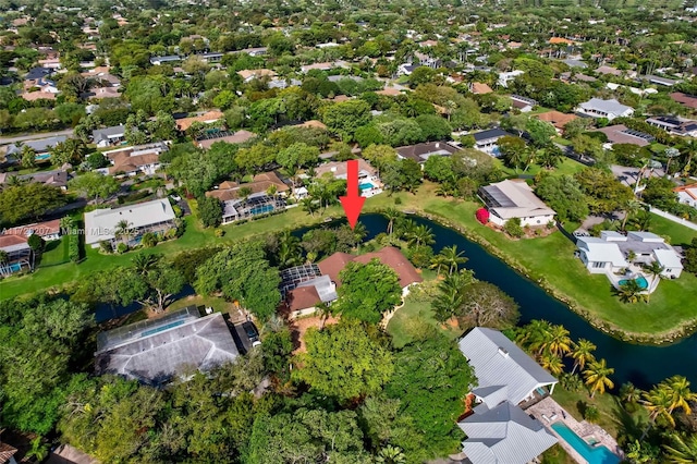 birds eye view of property featuring a water view and a residential view