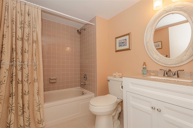 bathroom featuring toilet, shower / tub combo, and vanity