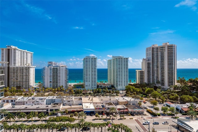 property's view of city with a water view