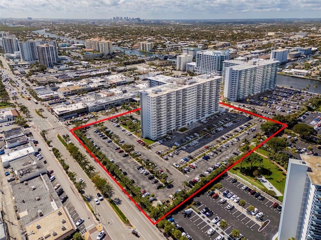 birds eye view of property with a city view