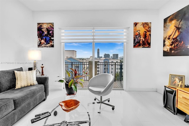 living area with a city view and baseboards