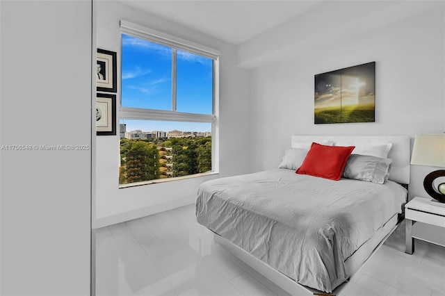 bedroom with baseboards