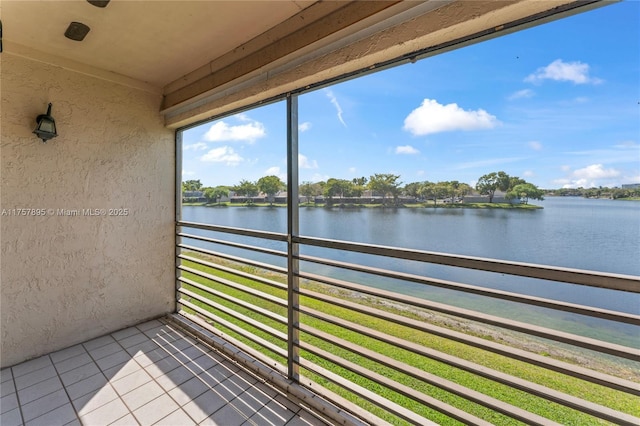 balcony featuring a water view