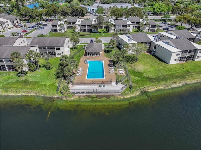 aerial view featuring a water view and a residential view