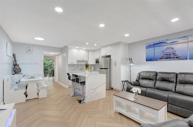 living area with recessed lighting