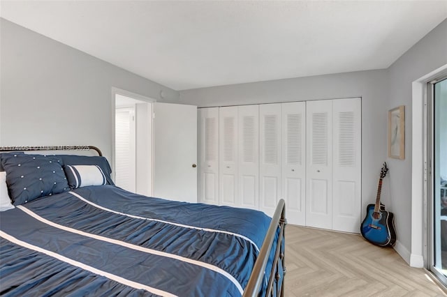 bedroom featuring a closet and baseboards