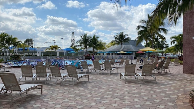 view of patio featuring fence