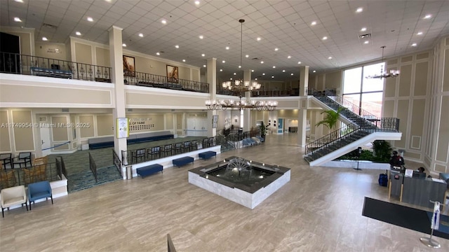 lobby featuring visible vents and stairway