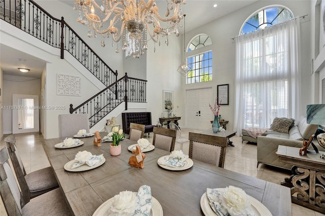 dining space with stairs, a chandelier, and tile patterned floors