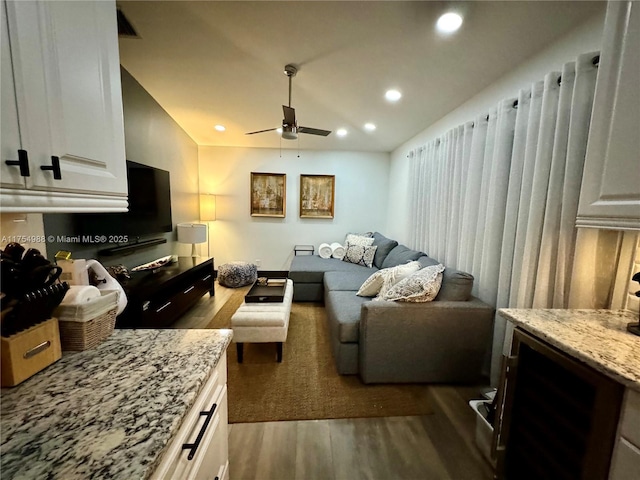 interior space with vaulted ceiling, recessed lighting, ceiling fan, and dark wood-style flooring