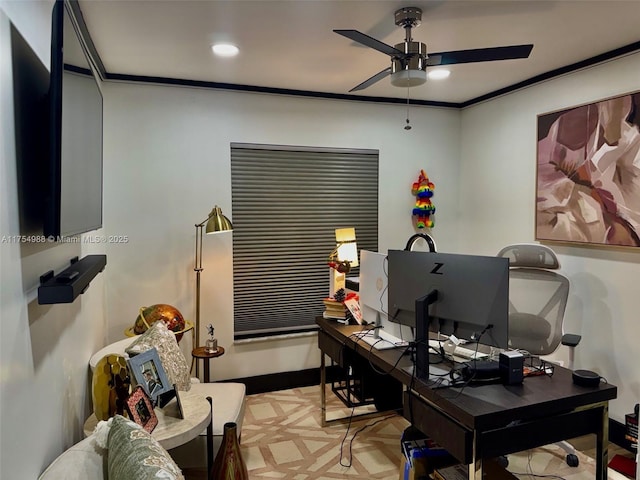 office area with ornamental molding, baseboards, and ceiling fan