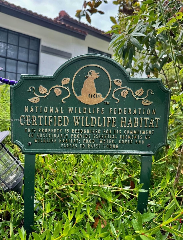 view of community sign