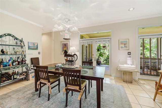 7685 SW 153rd St, Palmetto Bay, FL 33157 - dining space with light tile patterned floors, plenty of natural light, ornamental molding, and french doors