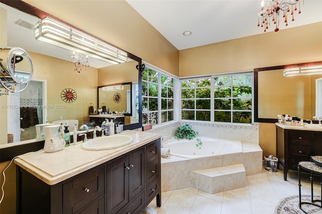 7685 SW 153rd St, Palmetto Bay, FL 33157 - bathroom with two vanities, visible vents, a sink, tile patterned flooring, and a whirlpool tub