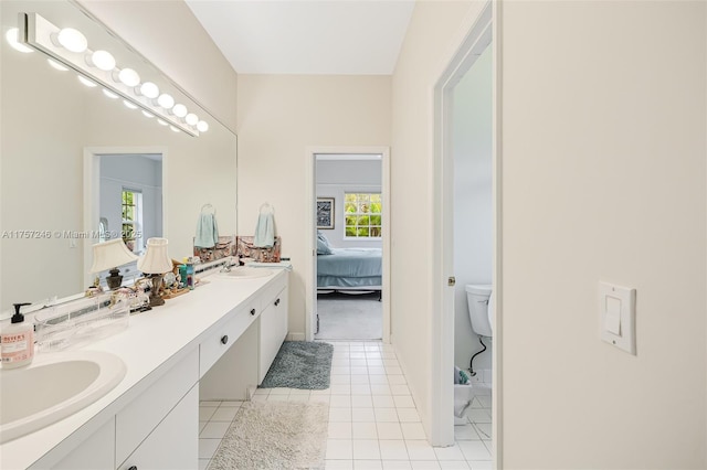 7685 SW 153rd St, Palmetto Bay, FL 33157 - full bath featuring ensuite bathroom, double vanity, a sink, and tile patterned floors
