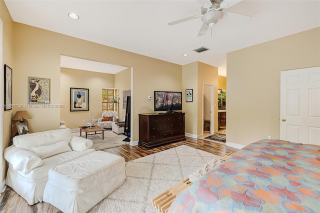 7685 SW 153rd St, Palmetto Bay, FL 33157 - bedroom featuring baseboards, visible vents, ceiling fan, wood finished floors, and recessed lighting