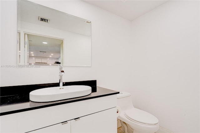 1250 S Miami Ave Unit 1109, Miami, FL 33130 - bathroom featuring visible vents, vanity, and toilet