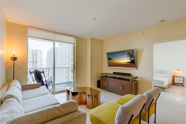 1250 S Miami Ave Unit 1109, Miami, FL 33130 - living room with expansive windows and a textured ceiling